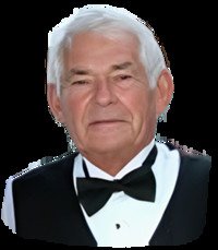 Older man in formal attire with bow tie.
