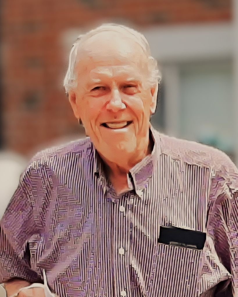 Smiling elderly man in striped shirt outdoors