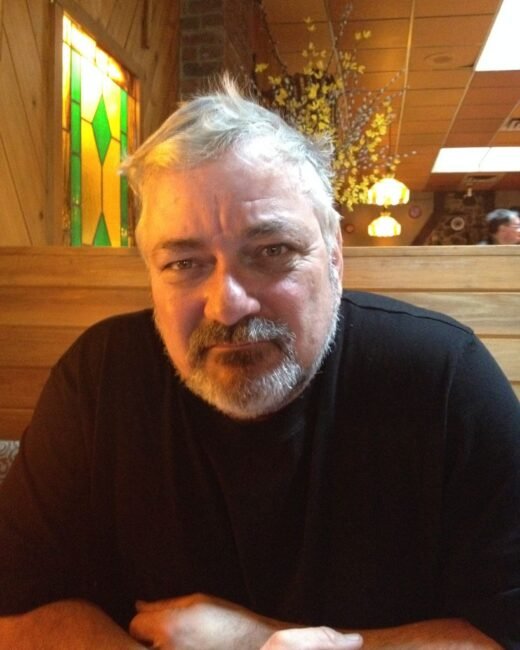 Man sitting in cozy restaurant interior