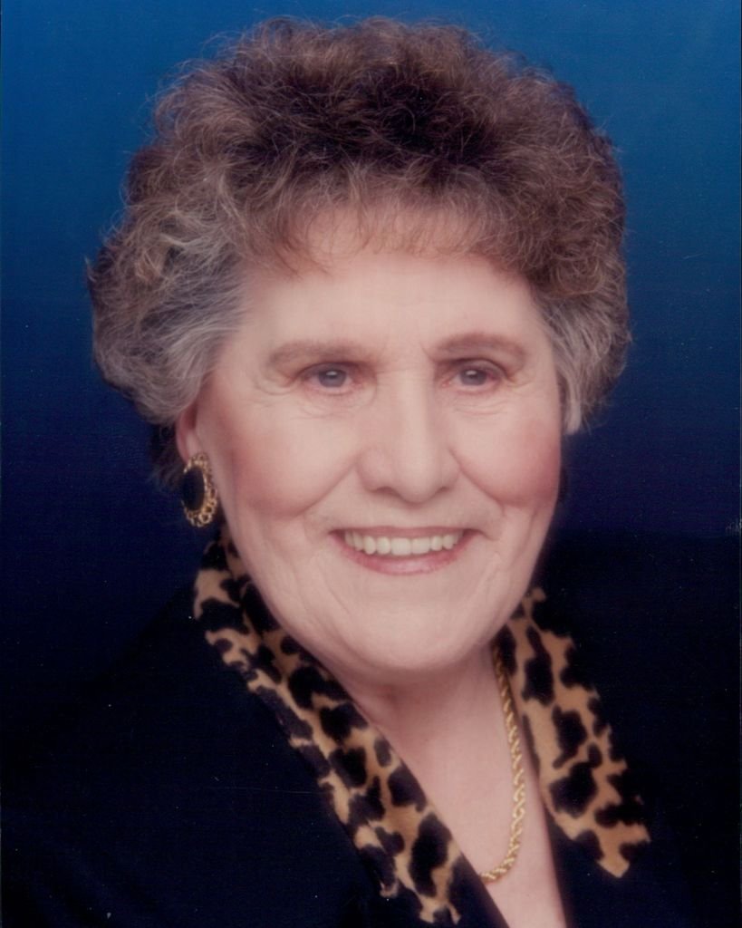 RIDEOUT, Joyce Rideout Elderly woman smiling, leopard print collar