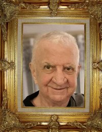 Elderly man smiling in ornate gold frame