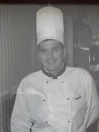Chef wearing a tall white hat
