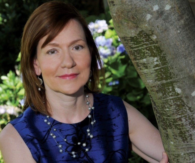 KRAN, Marcia Vaune Jocelyn Kran Woman near tree outdoors in garden setting