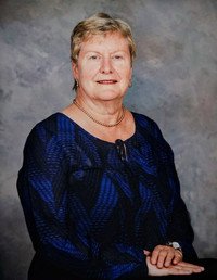 Smiling woman in blue blouse portrait