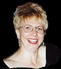Smiling person with glasses and short hair