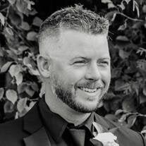 Man in suit smiling outdoors