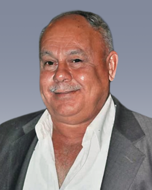 AFRIMALSOUAR, Matti Afrimalsouar Smiling man in suit with mustache