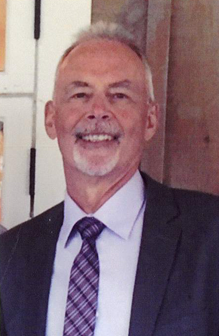 Smiling man in suit and tie