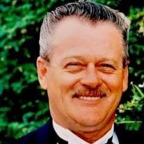 Smiling man in a suit outdoors
