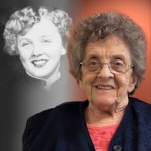 Elderly woman with vintage photo of younger self.