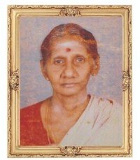 Portrait of an elderly woman in traditional attire.