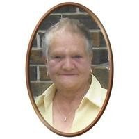 Portrait of a smiling elderly person, oval frame.