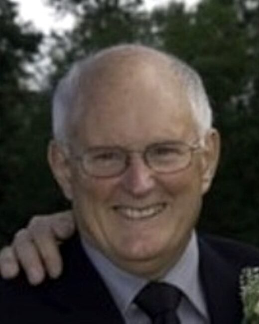 Smiling elderly man in suit outdoors
