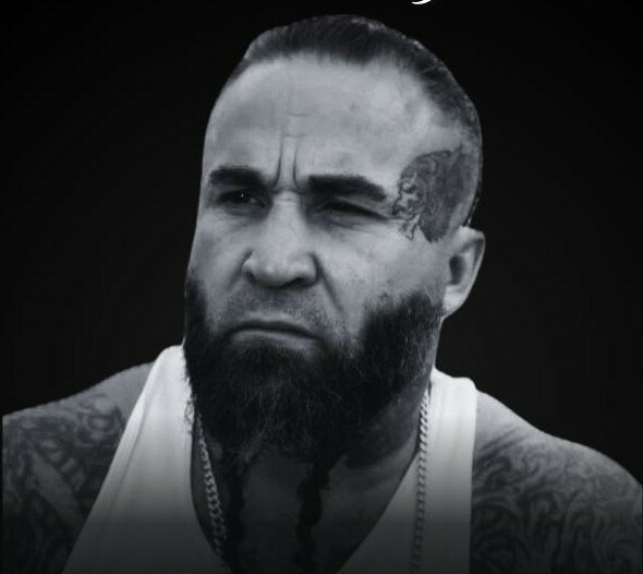 BOUDREAULT, Richard Boudreault Tattooed man with beard and white tank top