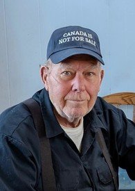 Elderly man wearing cap that says Canada is not for sale
