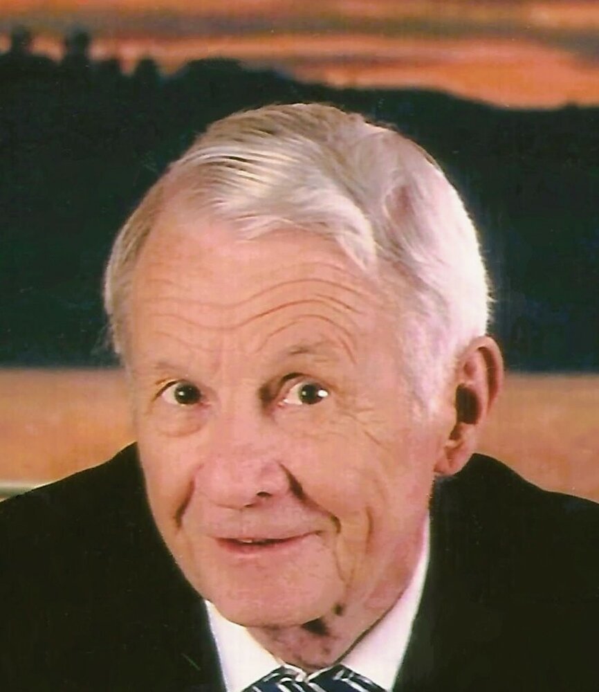 Elderly man smiling in sunset background.