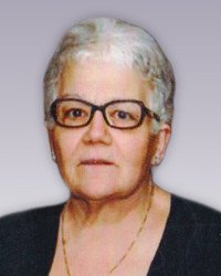 Older woman with glasses and white hair