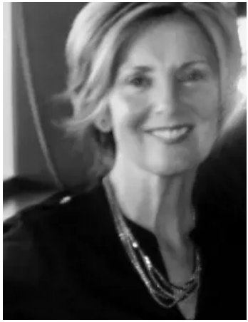 Smiling woman in black and white photograph