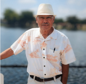 MANIERI, Francesco Manieri Smiling man in hat by the lake.