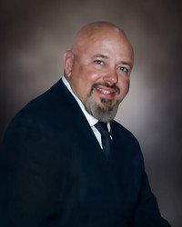 Smiling man in suit portrait.