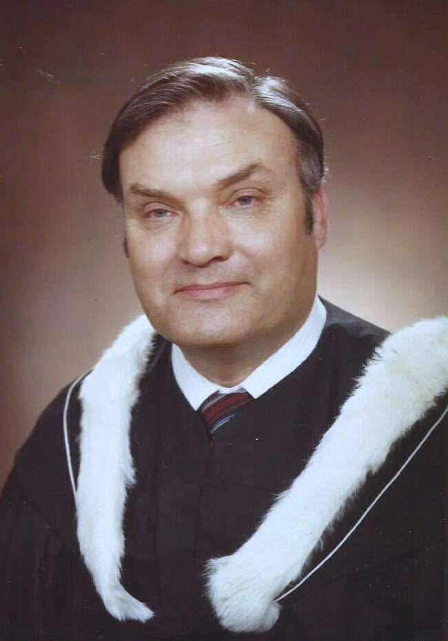 Man in academic regalia portrait