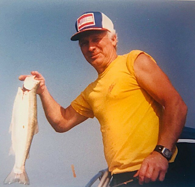 THOMSON, Warren Ross Thomson Man holding fish on boat in sunlight