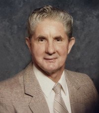 Elderly man wearing suit and tie, smiling