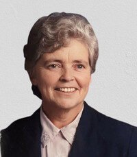 DUIMERING, Elizabeth (Betty) Duimering Smiling woman in a blazer and blouse.