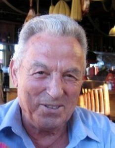 Smiling elderly man in a casual setting