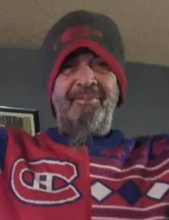 Man wearing Montreal Canadiens sweater and beanie