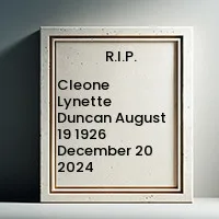 Memorial plaque with name and dates.