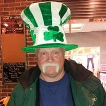 Man wearing green St. Patrick's Day hat